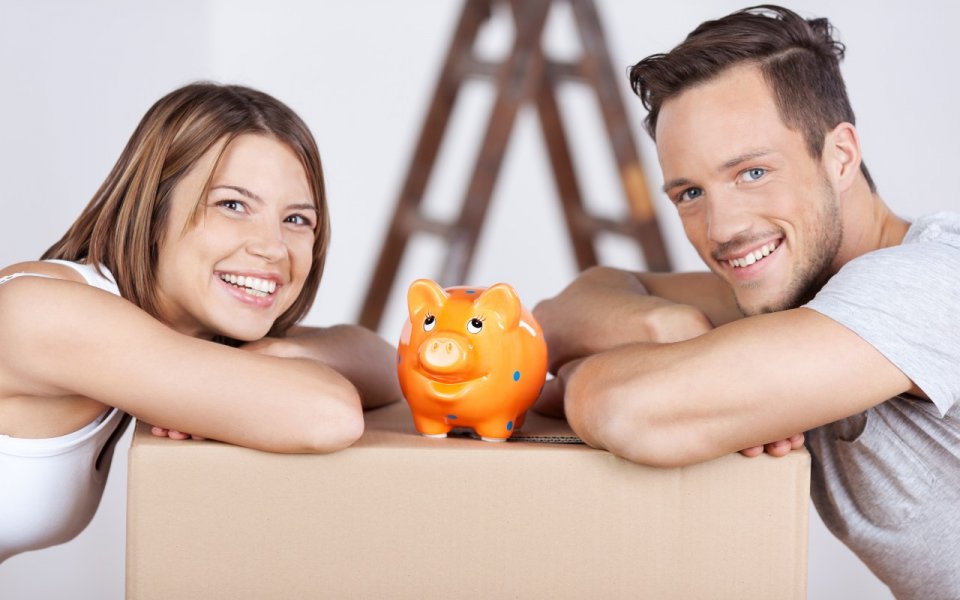 stel met oranje varkentje S shutterstock_142450381